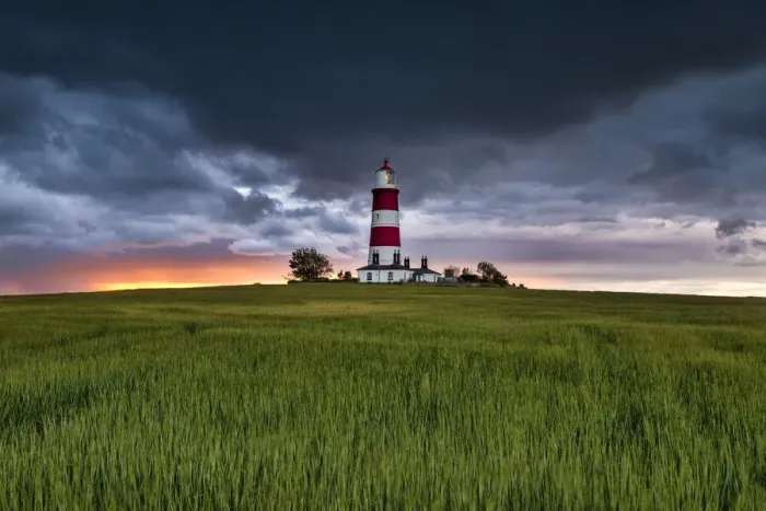 Framed Print : Storm Clouds at Sunset over Happisburgh Lighthouse, Norfolk, England Framed Print : Storm Clouds at Sunset over Happisburgh Lighthouse, Norfolk, England
