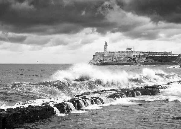 A stormy sea along the Malecon, Cuba, Havana, Castillo del Morro (Castillo de los