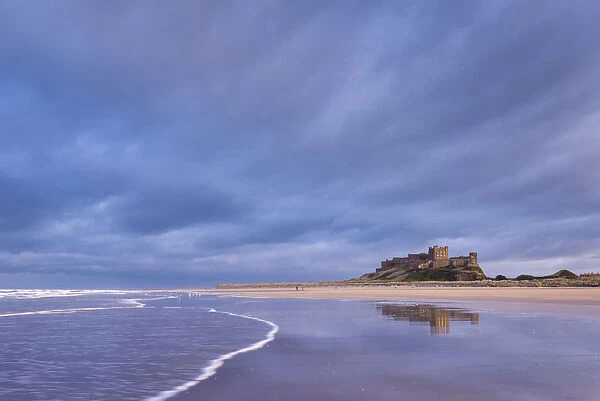 Stormy sky above Bamburgh Castle in Northumberland, England. Spring