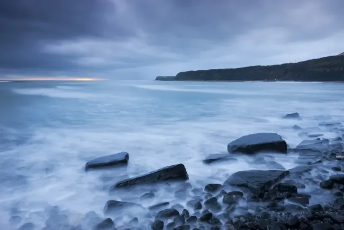 Framed Print : Stormy sunset at Kimmeridge Bay on the Jurassic Coast, Dorset, England. Winter