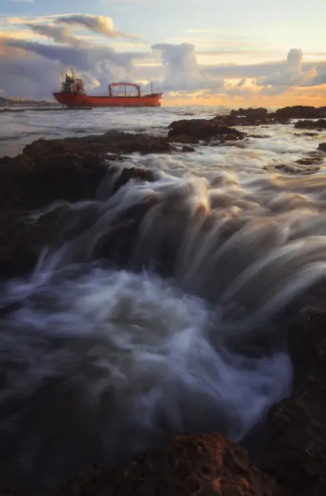 Framed Print : Stranded boat along the Tuscan coast at sunset, Livorno, Tuscany, Italy Framed Print : Stranded boat along the Tuscan coast at sunset, Livorno, Tuscany, Italy