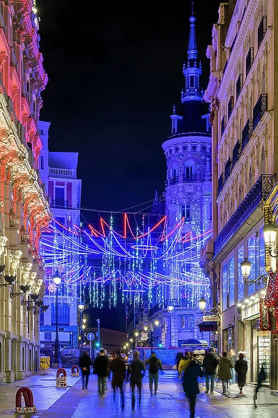Street adorned with Christmas lights in Madrid, Spain