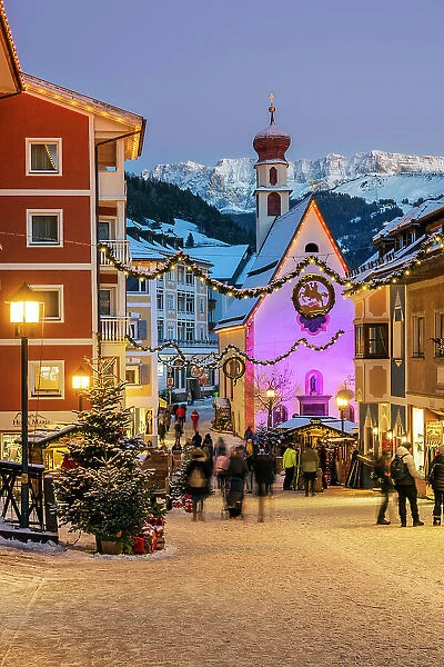 Street adorned with festive Christmas decorations, Ortisei - St. Ulrich, South Tyrol, Italy