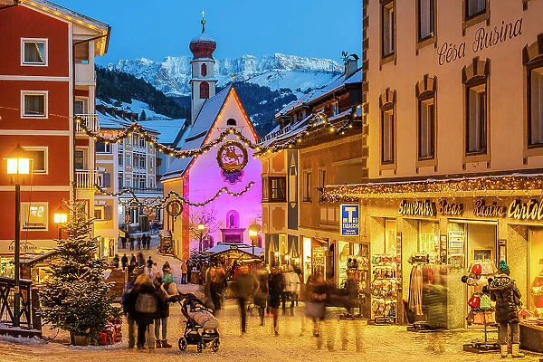 Street adorned with festive Christmas decorations, Ortisei - St. Ulrich, South Tyrol, Italy