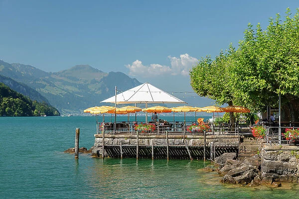 Street cafe in Brunnen at the promenade at Lake Lucerne, Canton Schwyz, Switzerland