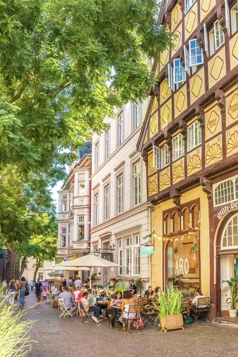 Framed Print : Street cafes and Degodehaus in the old town of Oldenburg, Oldenburger Land, Lower Saxony, Germany