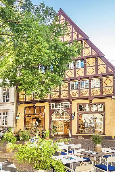 Street cafes and Degodehaus in the old town of Oldenburg, Oldenburger Land, Lower Saxony, Germany
