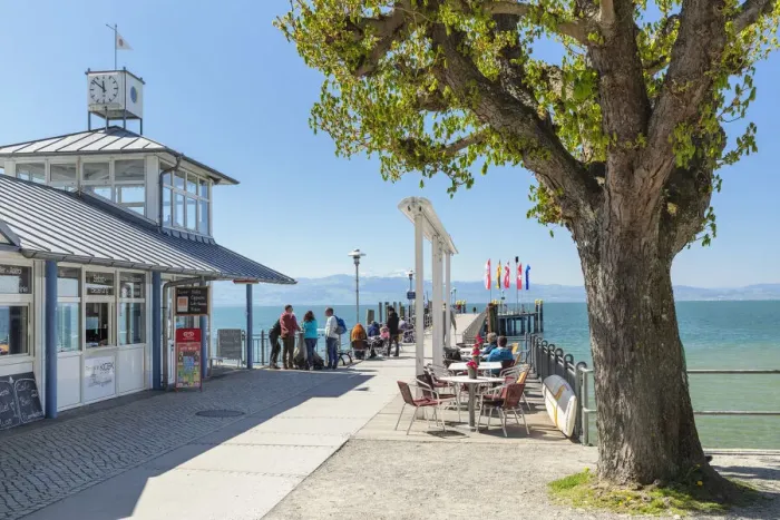 Framed Print : Street cafes at the landing stage in Kressbronn, Lake Constance, Upper Swabia, Baden Wurttemberg, Germany