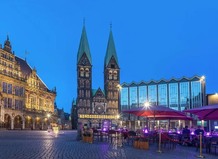 Framed Print : Street cafes on the market square with town hall and St. Petri Cathedral in the evening, Bremen, Germany Framed Print : Street cafes on the market square with town hall and St. Petri Cathedral in the evening, Bremen, Germany