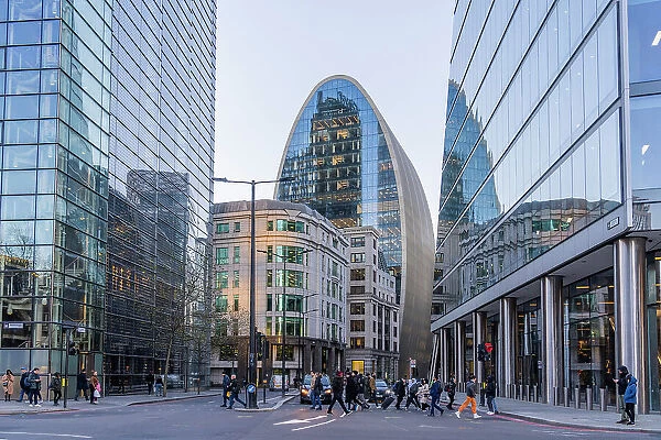 A street scene looking towards 70 St Mary Axe also known as The Can of Ham, City of London, London, England, Uk