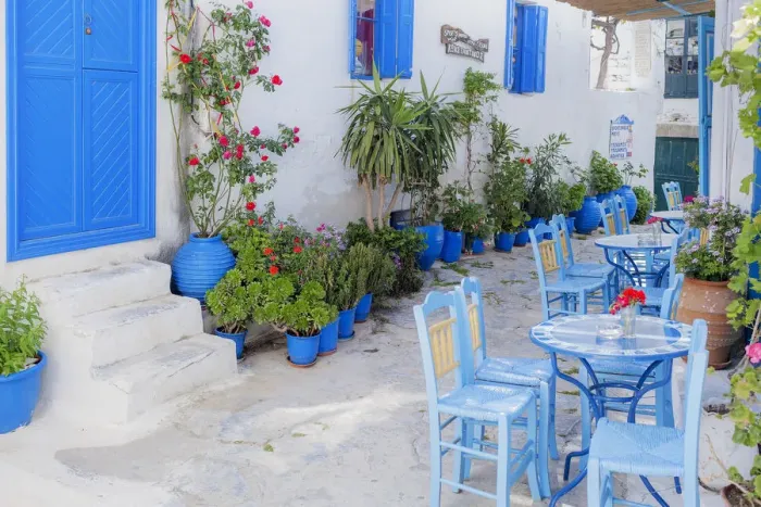 Framed Print : Streetside cafe tables and chairs, Amorgos, Cyclades Islands, Greece, Europe