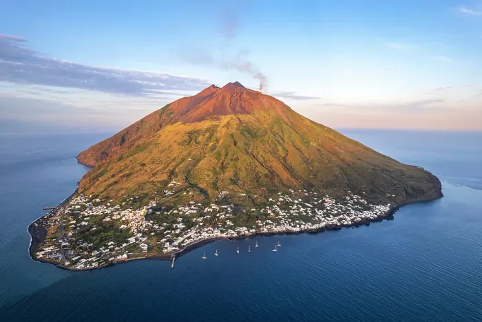 Framed Print : Stromboli village with black smoke rising from the crater of the volcano, Stromboli island, UNESCO World Heritage Site, Aeolian Islands, Sicily, Italy Framed Print : Stromboli village with black smoke rising from the crater of the volcano, Stromboli island, UNESCO World Heritage Site, Aeolian Islands, Sicily, Italy