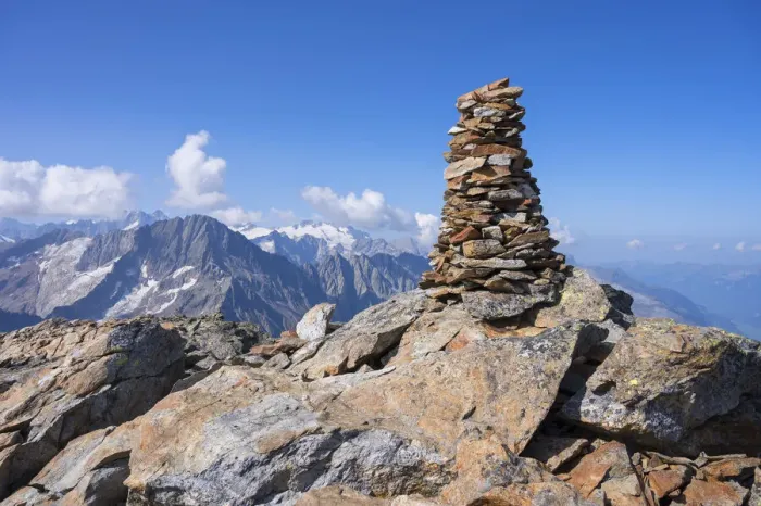 Framed Print : Summit cairn on Ofenhoren mountain with view at Bernese Alps, Urner Alps, canton Berne Framed Print : Summit cairn on Ofenhoren mountain with view at Bernese Alps, Urner Alps, canton Berne