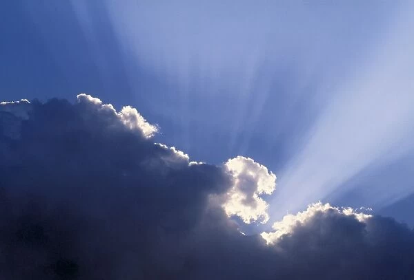 Sun rays through clouds
