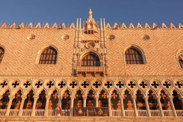 Sun Rays at Sunrise through the Arches of Palazzo Ducale (Doges Palace) St Mark