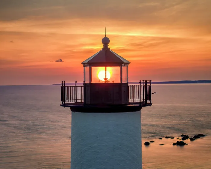 Framed Print : Sun rising through Tarpaulin Cove Lighthouse, Cape Cod, Naushon Island, Massachusetts, USA Framed Print : Sun rising through Tarpaulin Cove Lighthouse, Cape Cod, Naushon Island, Massachusetts, USA