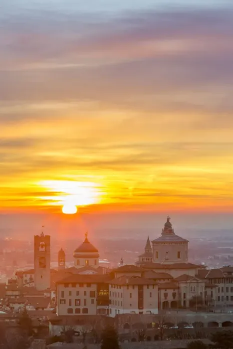 Framed Print : Sun rising above the upper city of Bergamo, Lombardy, italy Framed Print : Sun rising above the upper city of Bergamo, Lombardy, italy
