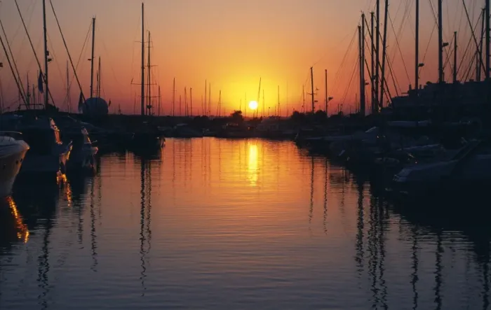 Framed Print : The sun sets over the yachts and pleasure boats in the marina Framed Print : The sun sets over the yachts and pleasure boats in the marina