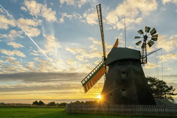 Framed Print : Sun setting behind Amrum mill, Nebel, Amrum island, Nordfriesland, Schleswig-Holstein, Germany Framed Print : Sun setting behind Amrum mill, Nebel, Amrum island, Nordfriesland, Schleswig-Holstein, Germany