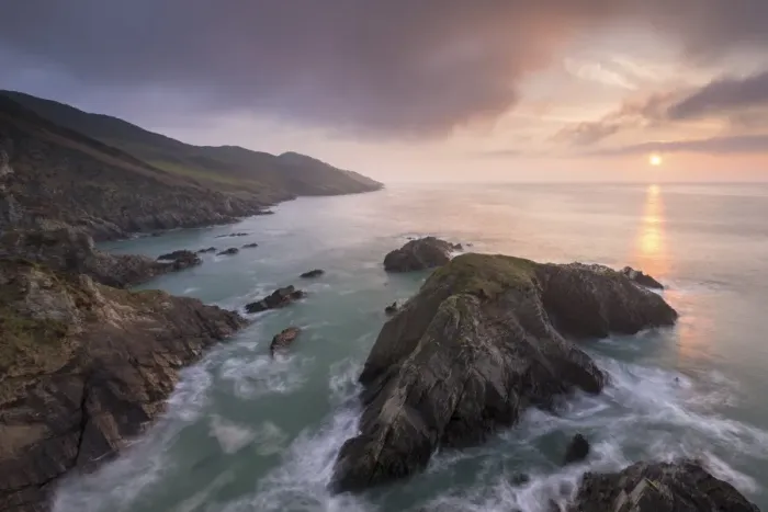 Framed Print : Sun setting over the North Devon coast, England. Spring (April)
