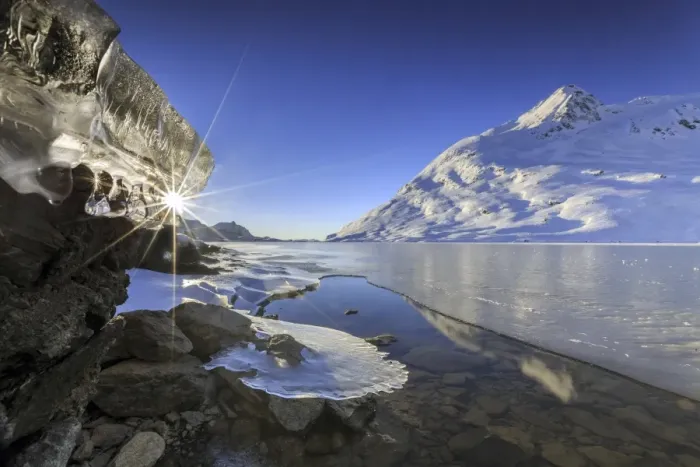 Framed Print : The sun shining through icicles on the shores of Lake Bianco, Canton of Graubunden Framed Print : The sun shining through icicles on the shores of Lake Bianco, Canton of Graubunden