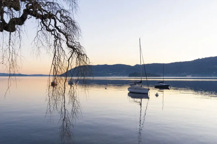Framed Print : Suna, Verbania province, Piedmont, Italy Sailboat on a buoy, sunset hour Framed Print : Suna, Verbania province, Piedmont, Italy Sailboat on a buoy, sunset hour