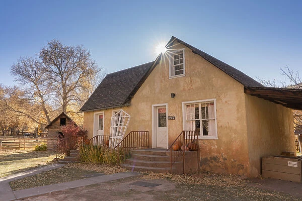 Sunbeam streaming over Historic Gifford House Museum and Store, Fruita
