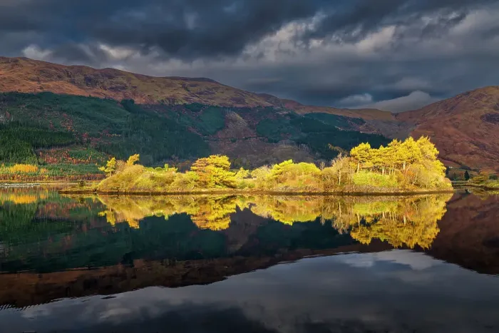 Framed Print : Sunlight Illuminating Eilean Munde Island, Loch Leven, Highland Region, Scotland Framed Print : Sunlight Illuminating Eilean Munde Island, Loch Leven, Highland Region, Scotland