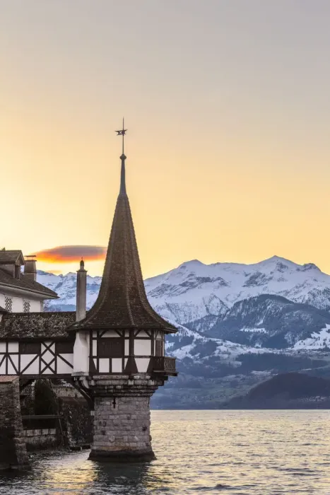 Framed Print : Sunrise at the castle of Oberhofen am Thunersee with the snow-covered Bernese Alps Framed Print : Sunrise at the castle of Oberhofen am Thunersee with the snow-covered Bernese Alps