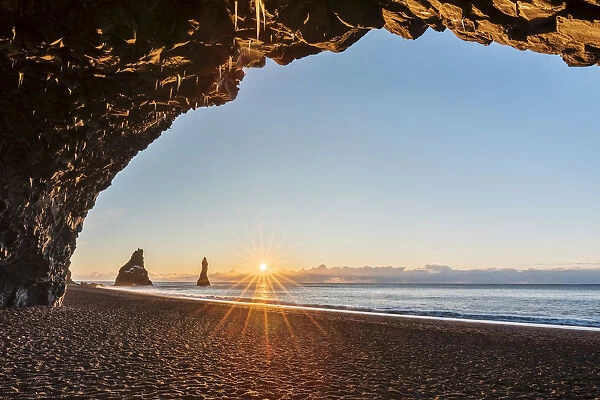 Sunrise from cave at Reynisfjara beach, Vaik, Southern Iceland, Iceland