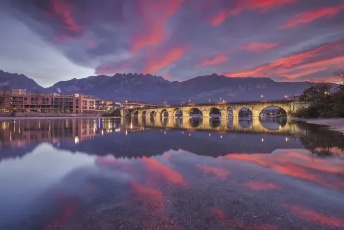 Framed Print : Sunrise on Lecco mountains (Resegone) reflected into the Adda River, Azzone Visconti bridge, Lecco city, lake Como, Lombardy, Italy Framed Print : Sunrise on Lecco mountains (Resegone) reflected into the Adda River, Azzone Visconti bridge, Lecco city, lake Como, Lombardy, Italy