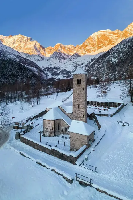 Framed Print : Sunrise in front of Monte Rosa from the old church of Macugnaga in winter. Valle Anzasca, Ossola, province of Verbania, Piedmont, italian alps, Italy Framed Print : Sunrise in front of Monte Rosa from the old church of Macugnaga in winter. Valle Anzasca, Ossola, province of Verbania, Piedmont, italian alps, Italy