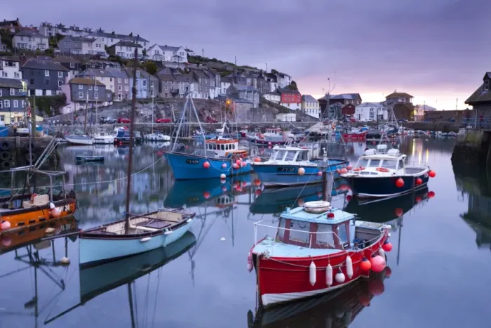 Framed Print : Sunrise over the picturesque harbour at Mevagissey, Cornwall, England. Spring