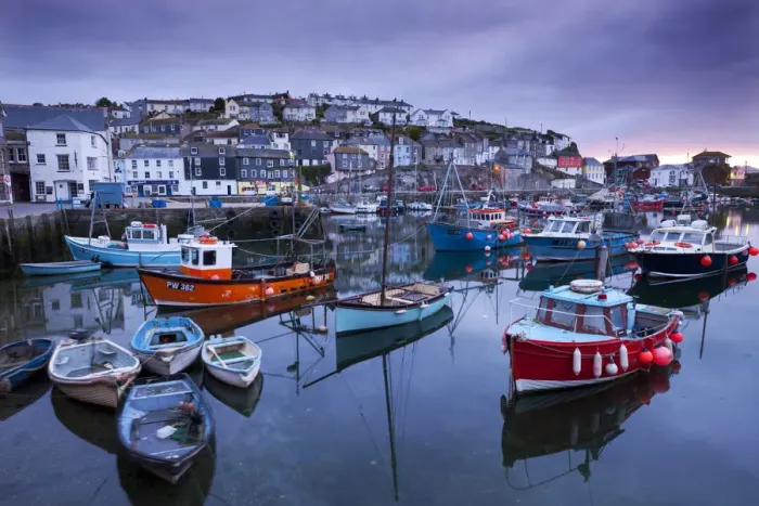Framed Print : Sunrise over the picturesque harbour at Mevagissey, Cornwall, England. Spring Framed Print : Sunrise over the picturesque harbour at Mevagissey, Cornwall, England. Spring
