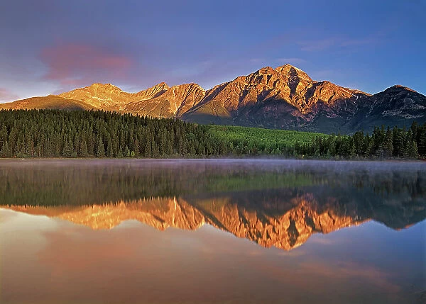 sunrise on Pyramid Mountain at Pyramid Lake, Jasper National Park, Alberta, Canada