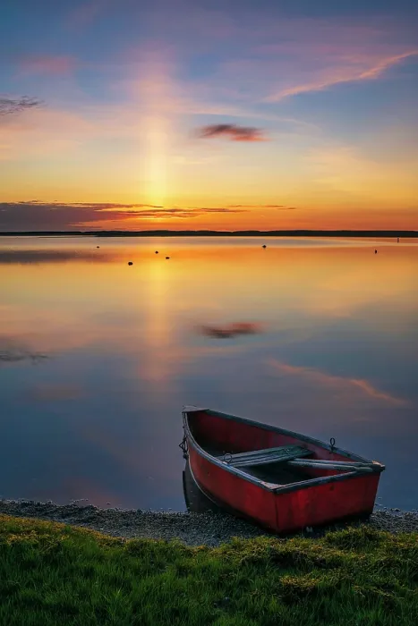 Framed Print : Sunrise over red rowboat at a marsh on Cape Cod, Massachusetts, USA Framed Print : Sunrise over red rowboat at a marsh on Cape Cod, Massachusetts, USA