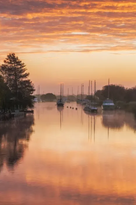 Framed Print : Sunrise over the River Frome at Wareham, Dorset, England, UK Framed Print : Sunrise over the River Frome at Wareham, Dorset, England, UK