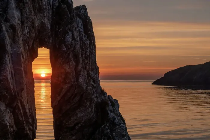 Framed Print : Sunrise through a rock arch at the Victorian brickworks site at Porth Wen, Anglesey, Wales, UK. Spring (May) 2019 Framed Print : Sunrise through a rock arch at the Victorian brickworks site at Porth Wen, Anglesey, Wales, UK. Spring (May) 2019
