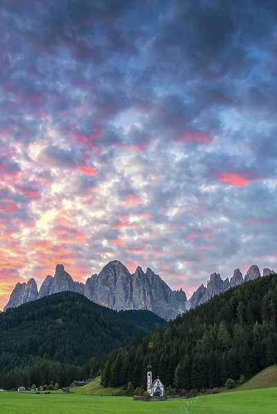 Sunrise in San Giovanni in Ranui in Funes valley. Europe, Italy, Bolzano province