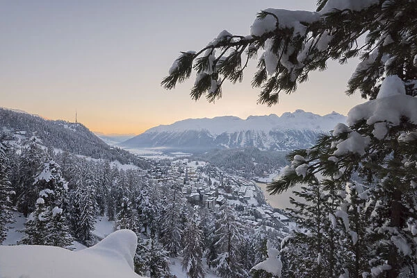 The sunrise on St. Moritz after snowy night, Canton of Graubunden, Engadin, Switzerland