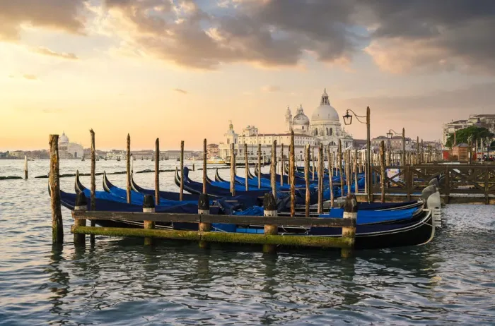 Framed Print : Sunrise in Venice with gondolas and Santa Maria della Salute church on the background Framed Print : Sunrise in Venice with gondolas and Santa Maria della Salute church on the background