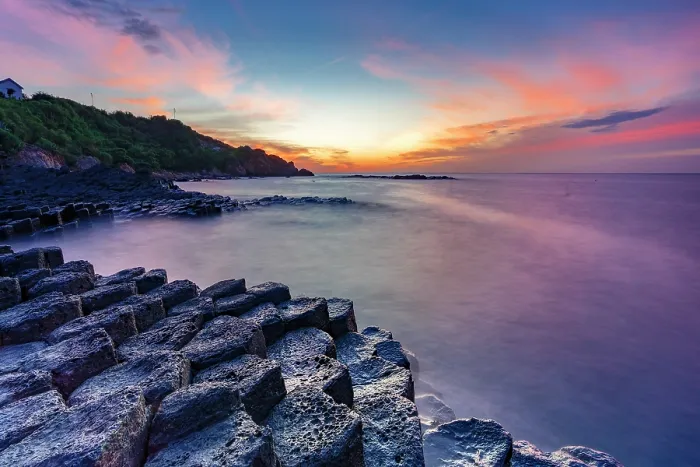 Framed Print : Sunrise over the volcanic rock formations of Ghenh Da Dia bassalt rocks, Phu Yen, Vietnam Framed Print : Sunrise over the volcanic rock formations of Ghenh Da Dia bassalt rocks, Phu Yen, Vietnam