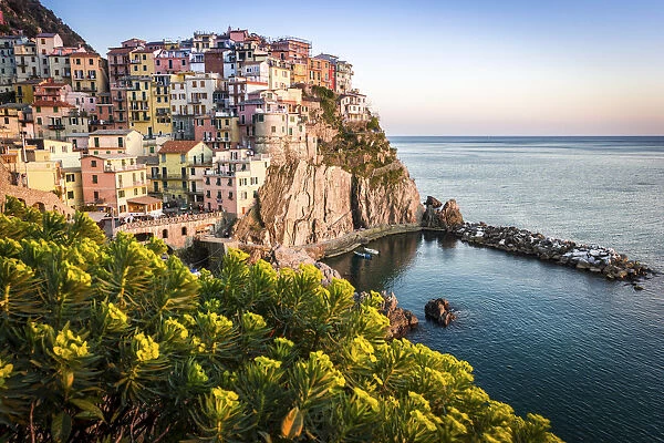 sunset over the beautiful town of Manarola, Cinque Terre National Park, Italy