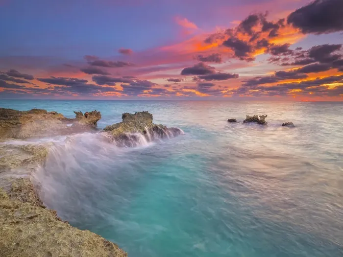 Framed Print : Sunset on the Caribbean Sea along the rugged ironshore of Grand Cayman, Cayman Islands, British West Indies Framed Print : Sunset on the Caribbean Sea along the rugged ironshore of Grand Cayman, Cayman Islands, British West Indies