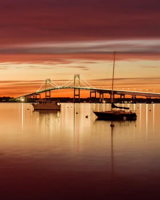 Framed Print : Sunset over the Clairborne Pell Bridge in Narragansett Bay with boats, Newport, Rhode Island, USA Framed Print : Sunset over the Clairborne Pell Bridge in Narragansett Bay with boats, Newport, Rhode Island, USA