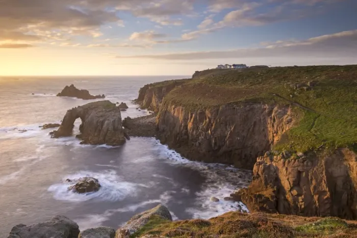 Framed Print : Sunset over Lands End on the western tip of Cornwall, England. Autumn (September) 2015