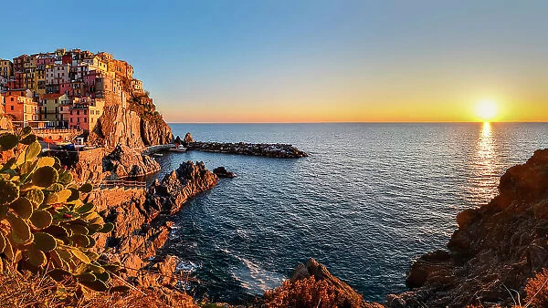 Sunset on Manarola, municipality of Riomaggiore, National Park of Cinque Terre, La Spezia province, Liguria district, Italy, Europe