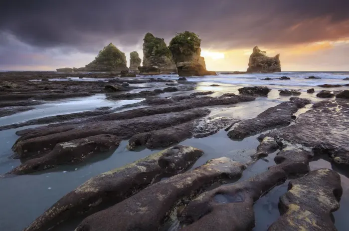 Framed Print : Sunset at Motukieie beach, West Coast, New Zealand