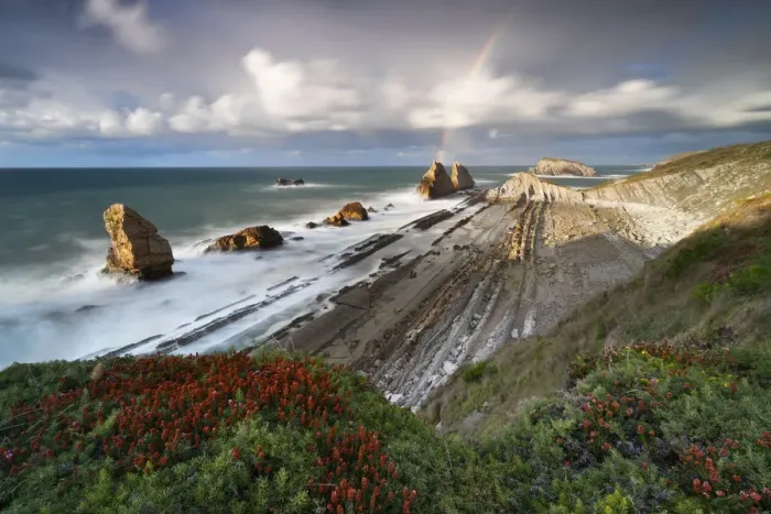 Framed Print : Sunset with rainbow at Playa de la Arnia, Boo de Pielagos, Cantabria, Spain Framed Print : Sunset with rainbow at Playa de la Arnia, Boo de Pielagos, Cantabria, Spain