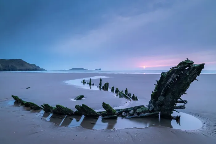 Framed Print : Sunset over the shipwreck of the Helvatia on Rhossili Bay, Gower, South Wales, UK. Spring (March) 2022 Framed Print : Sunset over the shipwreck of the Helvatia on Rhossili Bay, Gower, South Wales, UK. Spring (March) 2022